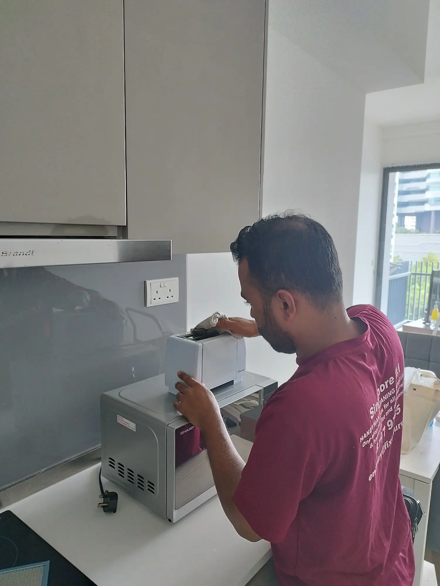 Toaster cleaning completed as part of end of tenancy cleaning in Singapore
