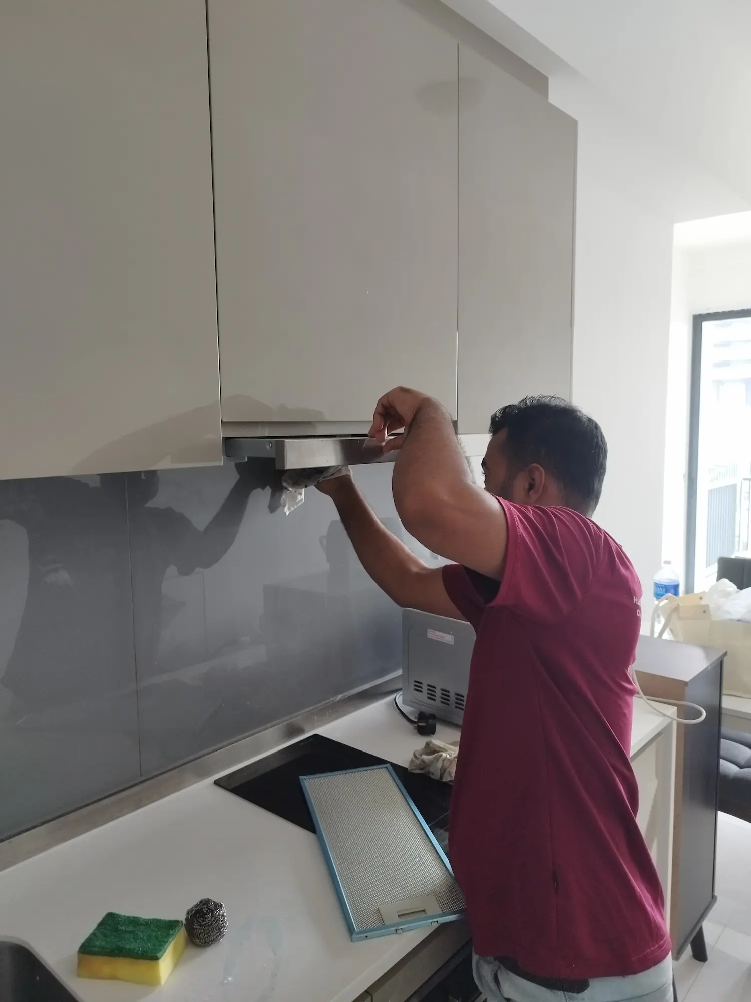 Kitchen cleaning completed for a move-out handover in Singapore